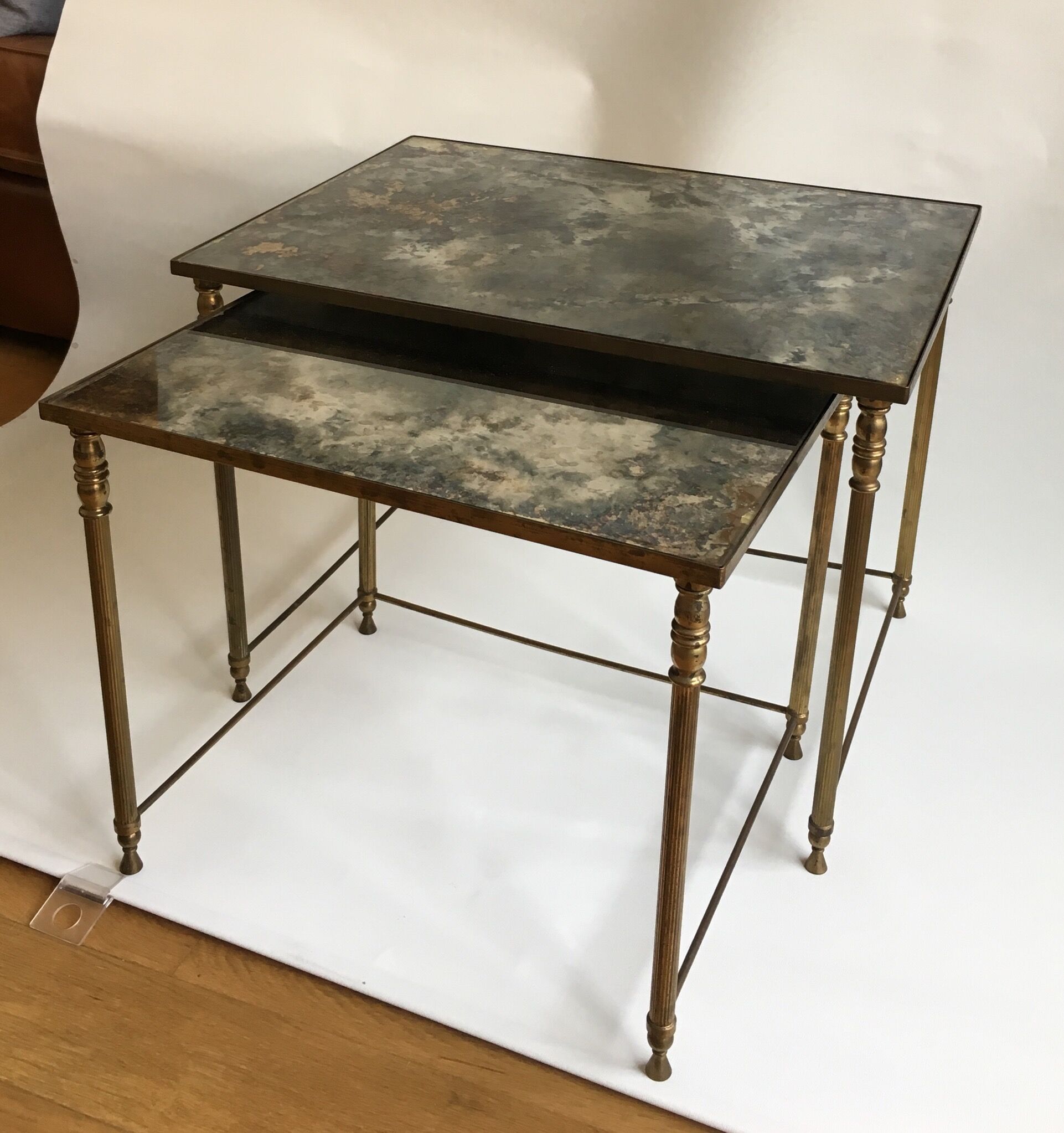 Brass and glass mirrored nesting tables