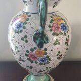 Old porcelain earthenware vase with floral decor