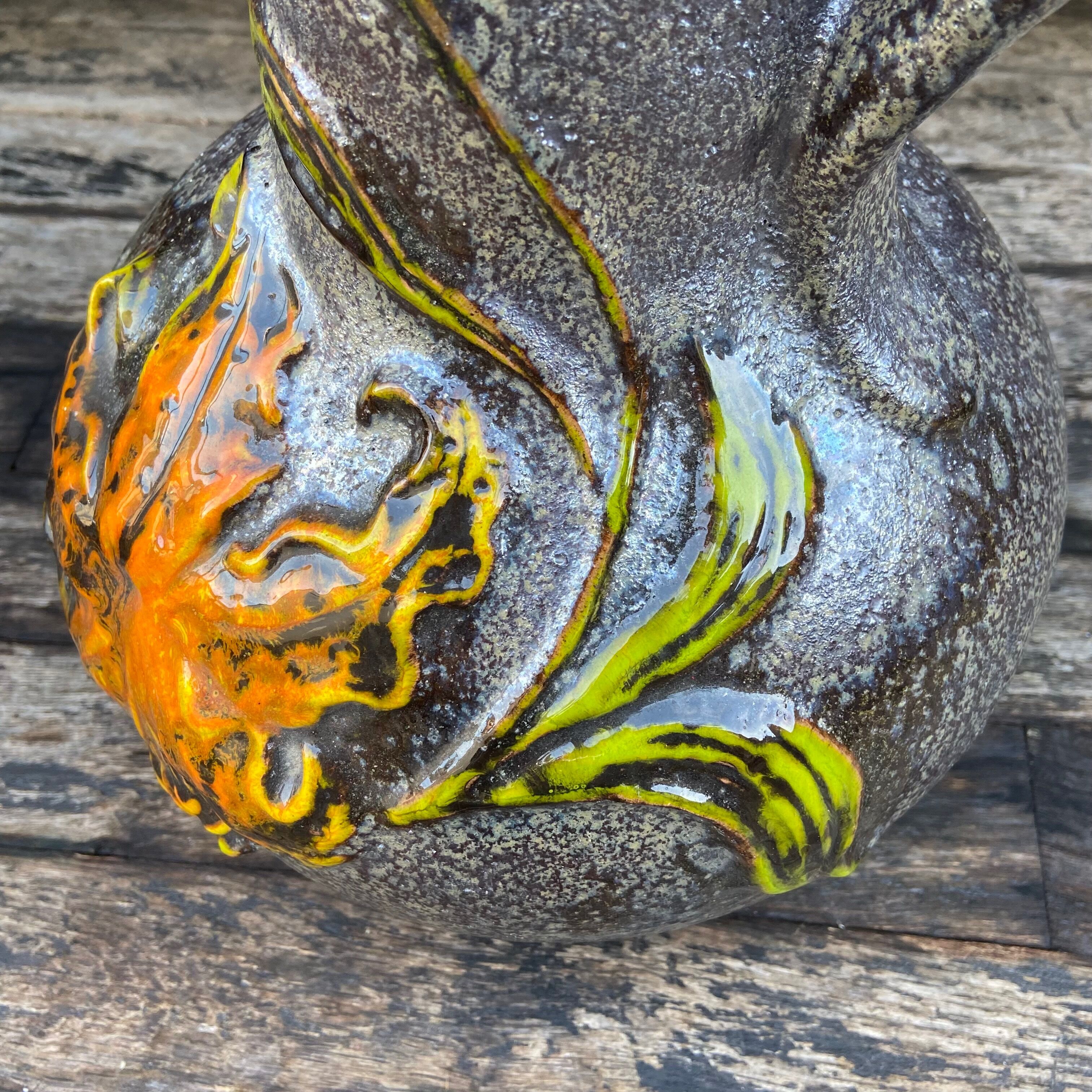 Vintage enamelled ceramic laying vase