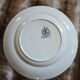 13 mismatched flat plates in ironstone
