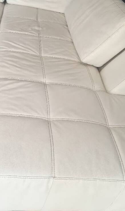 White leather corner sofa