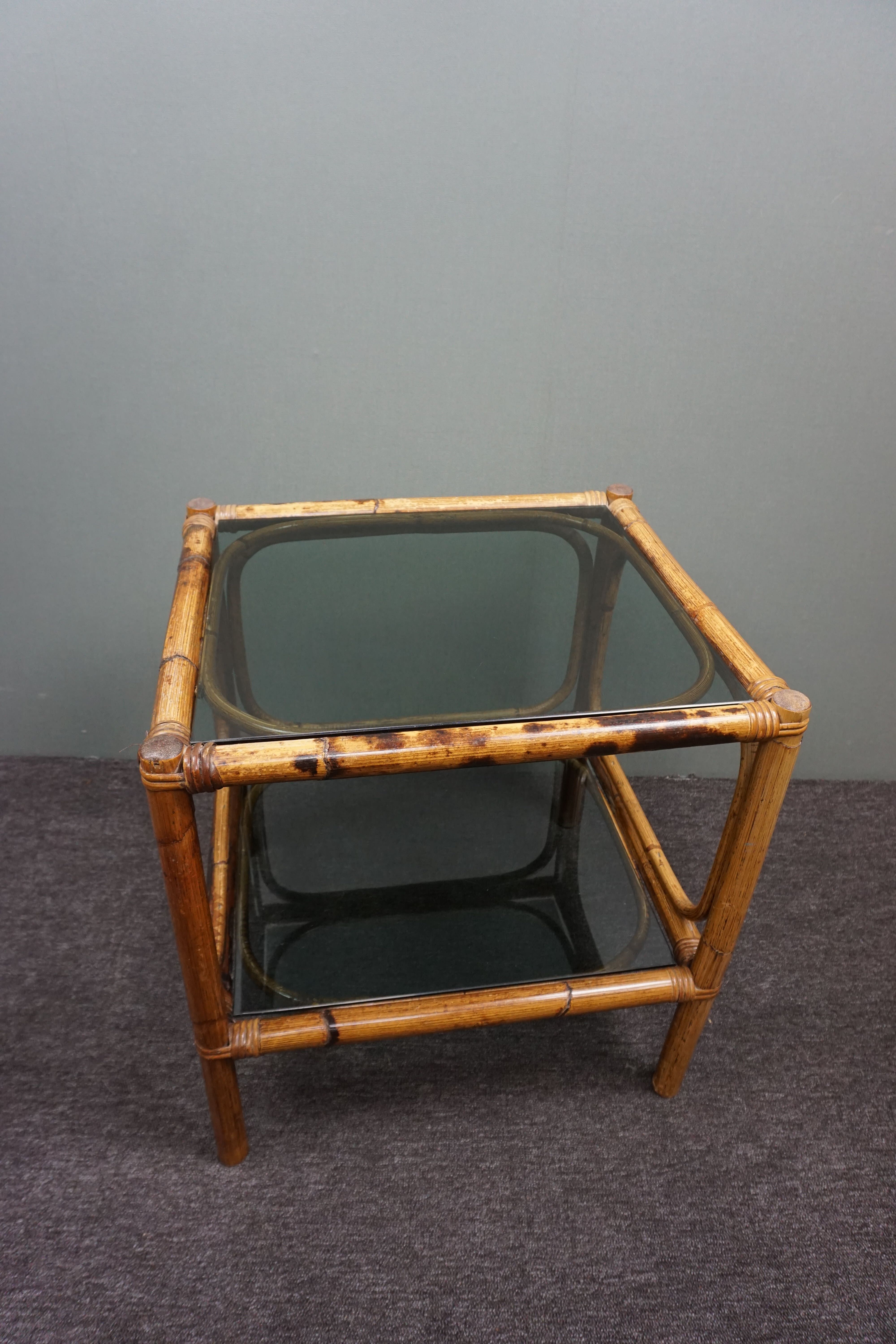 Rattan side table with smoked glass tops