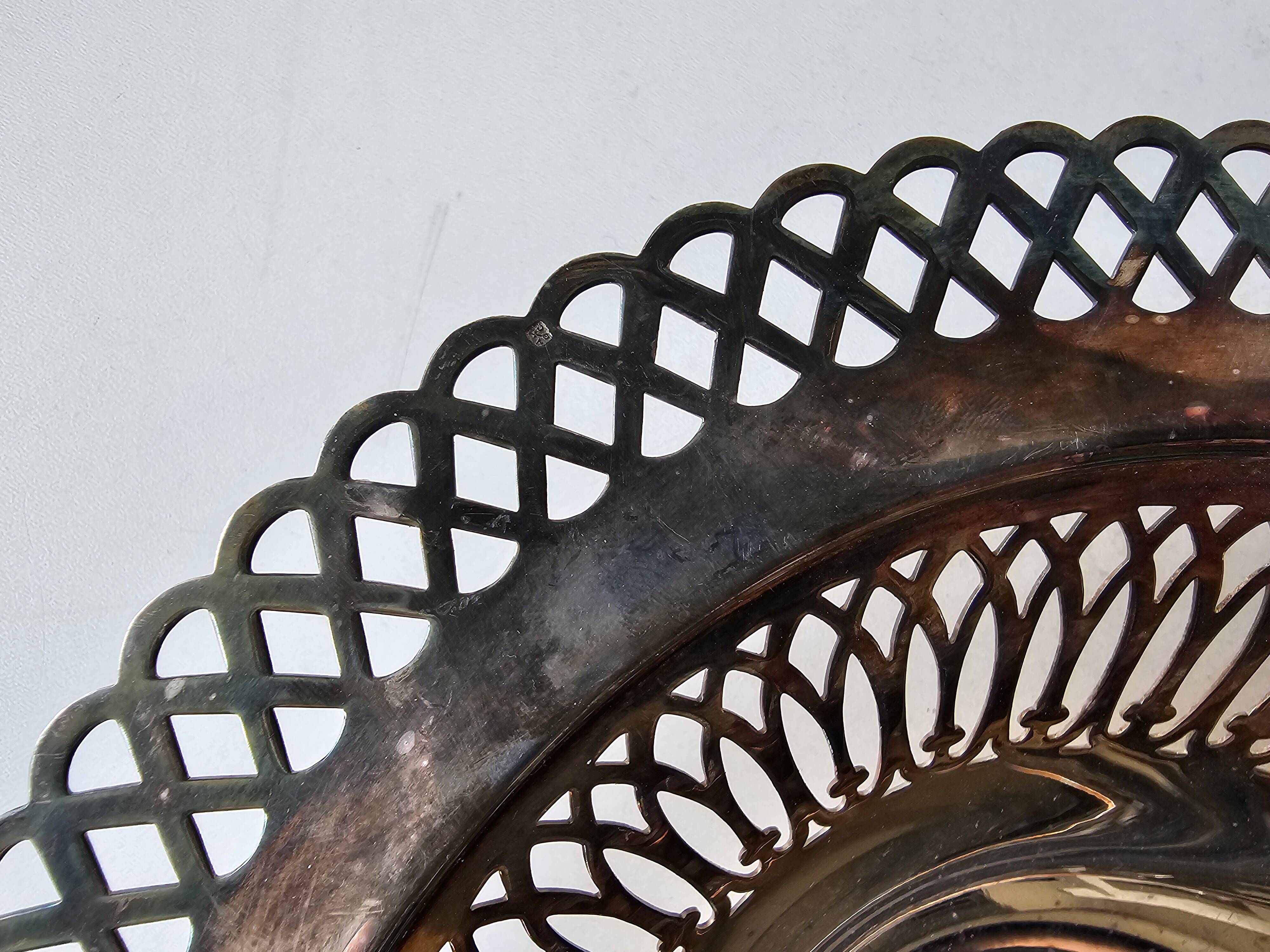 Silver-plated metal basket, openwork rim, hallmark to be identified