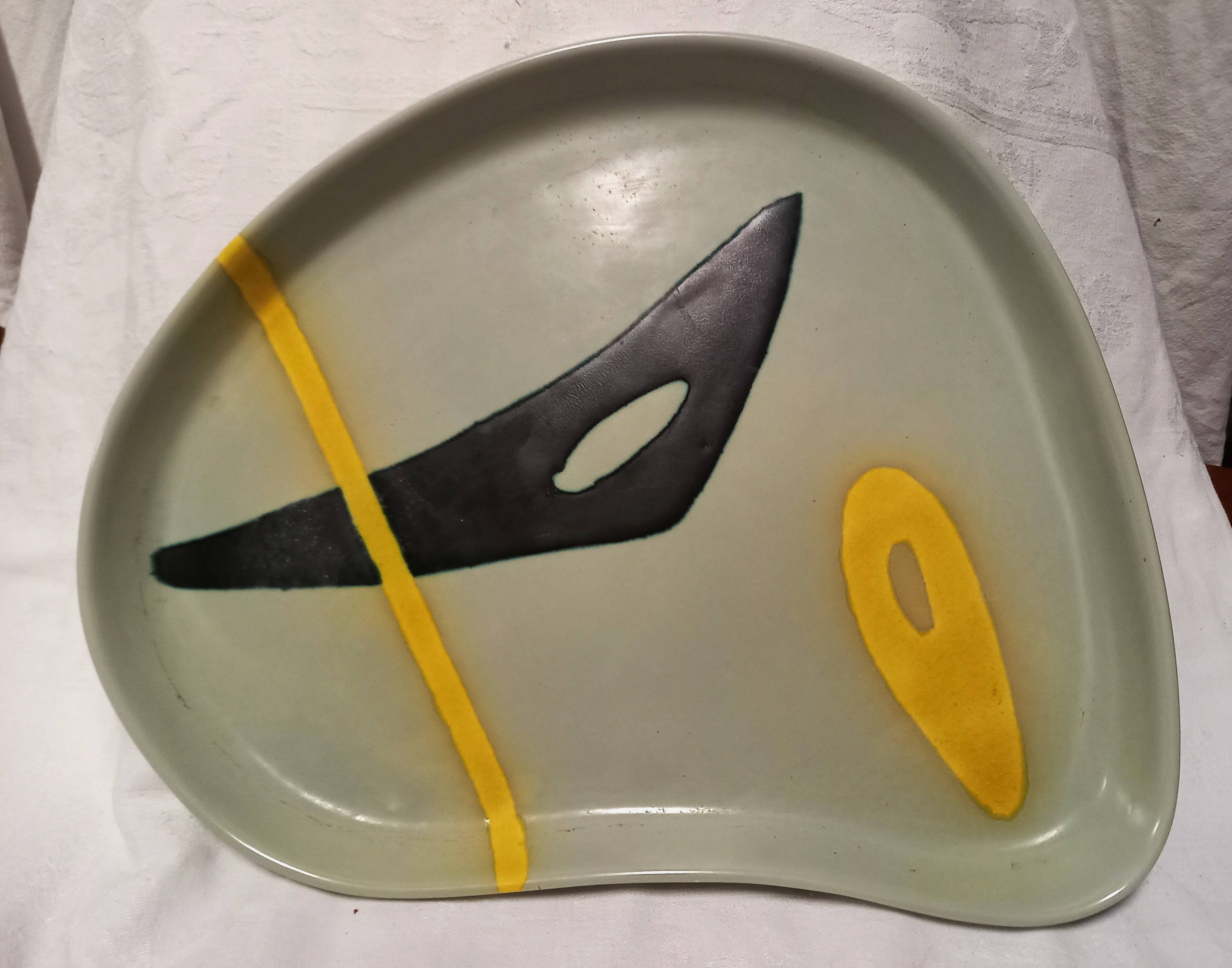 Ceramic dish by Peter Orlando, free form with abstract decoration, 1950s