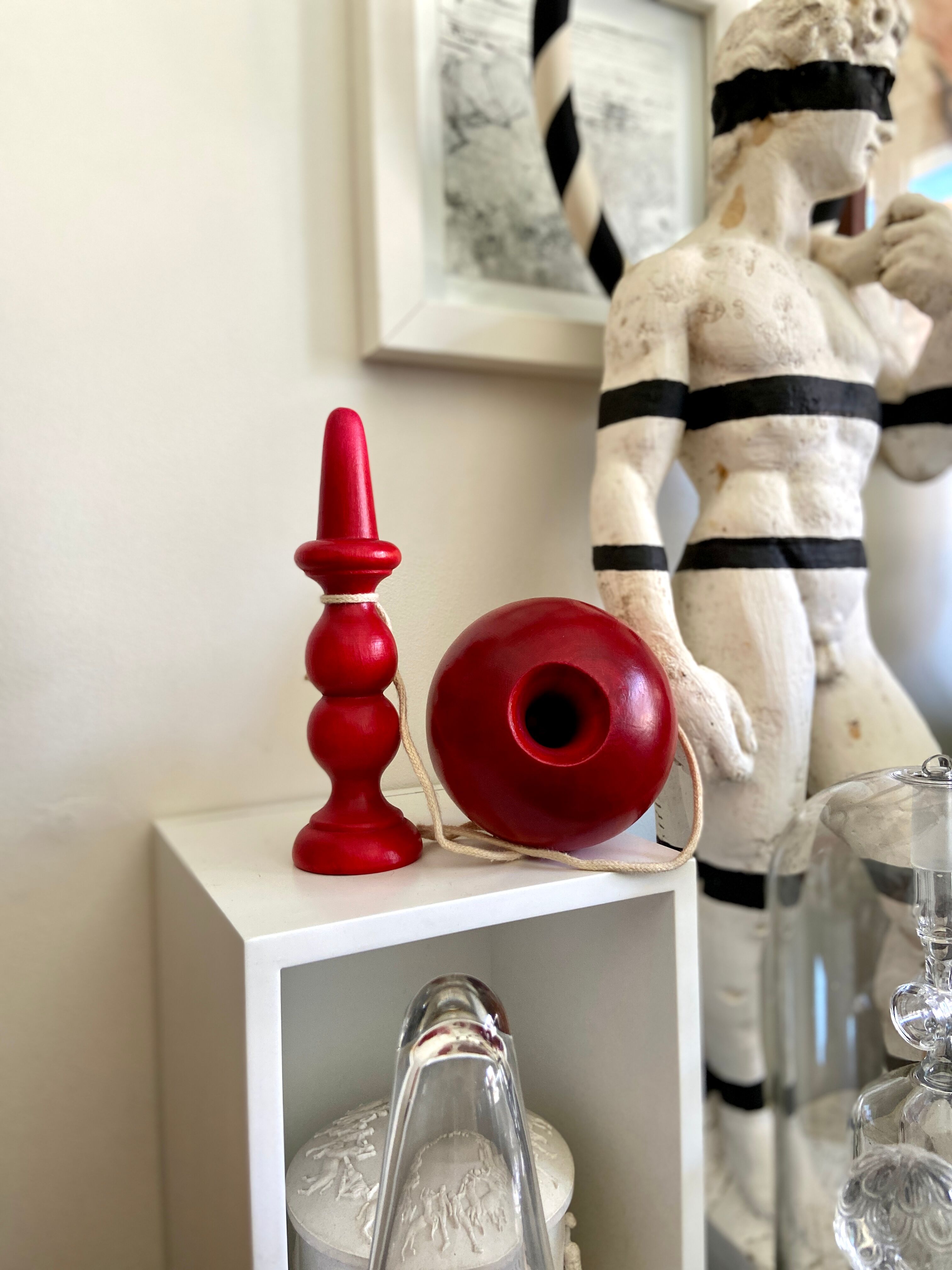 Bilboquet in red wood