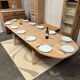 Solid oak farmhouse table with extensions.
