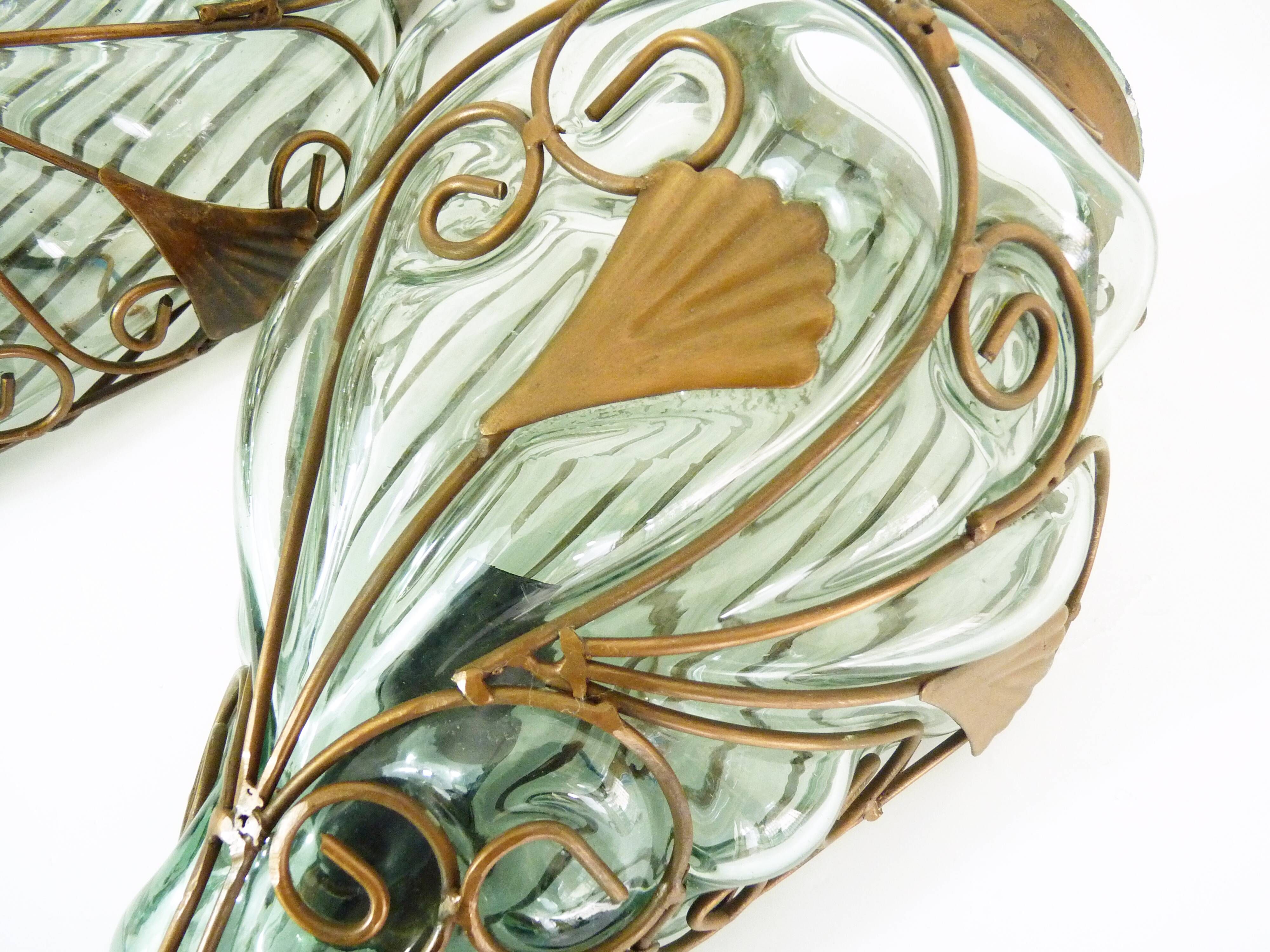 Pair of wall light cage in blown glass green color and wrought iron. Murano style. Year 80