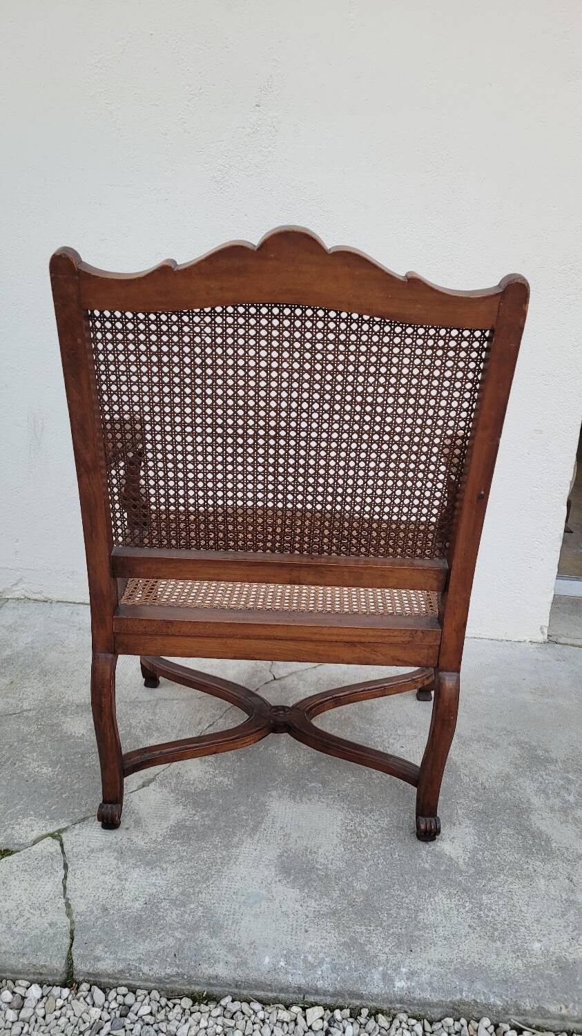 Louis XV Regency cane armchair leather armrests decorated with shell