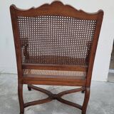 Louis XV Regency cane armchair leather armrests decorated with shell