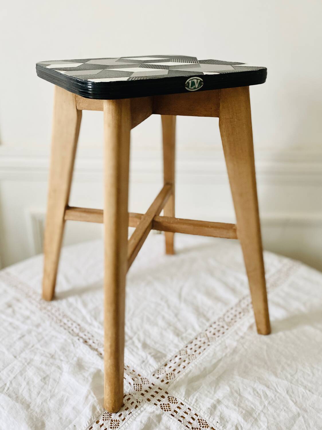 Vintage LV brand wood and formica stool from the 1950s