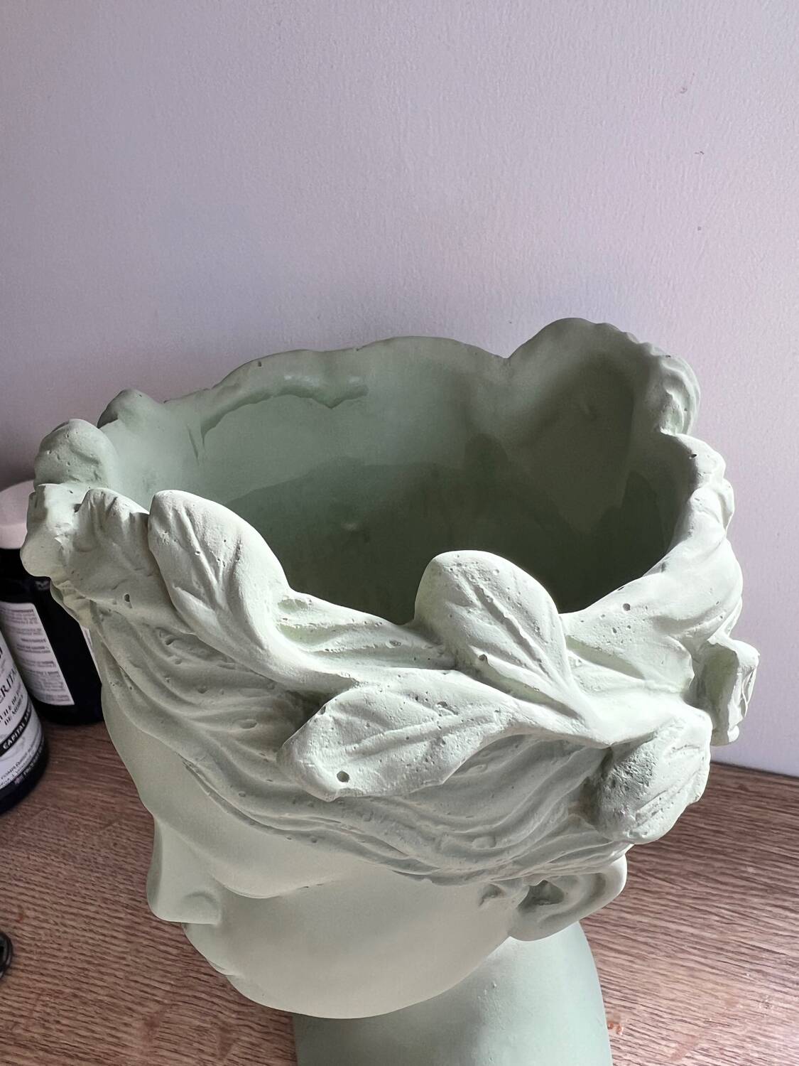 Antique sculpture face vase