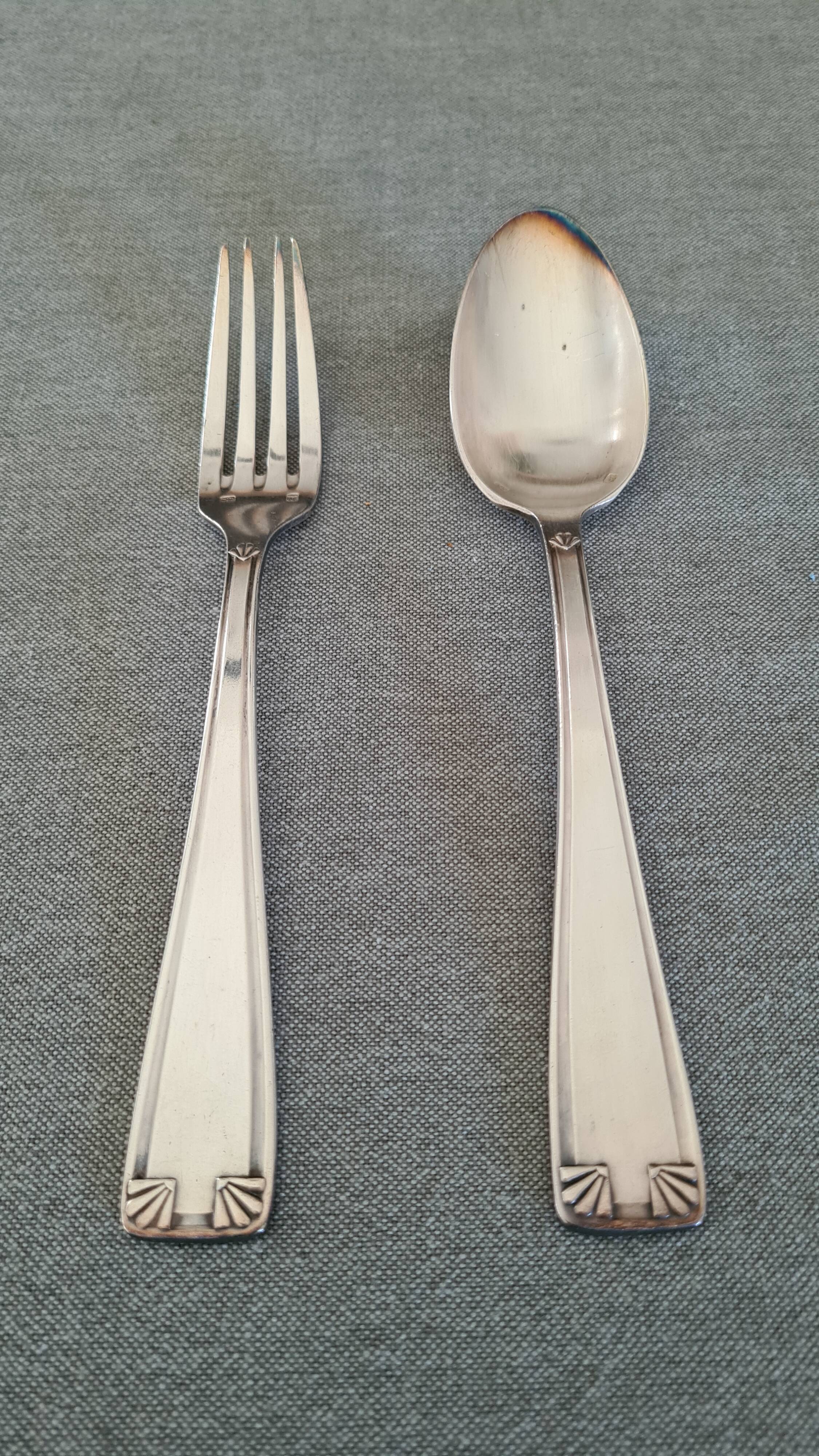 Silver metal cutlery