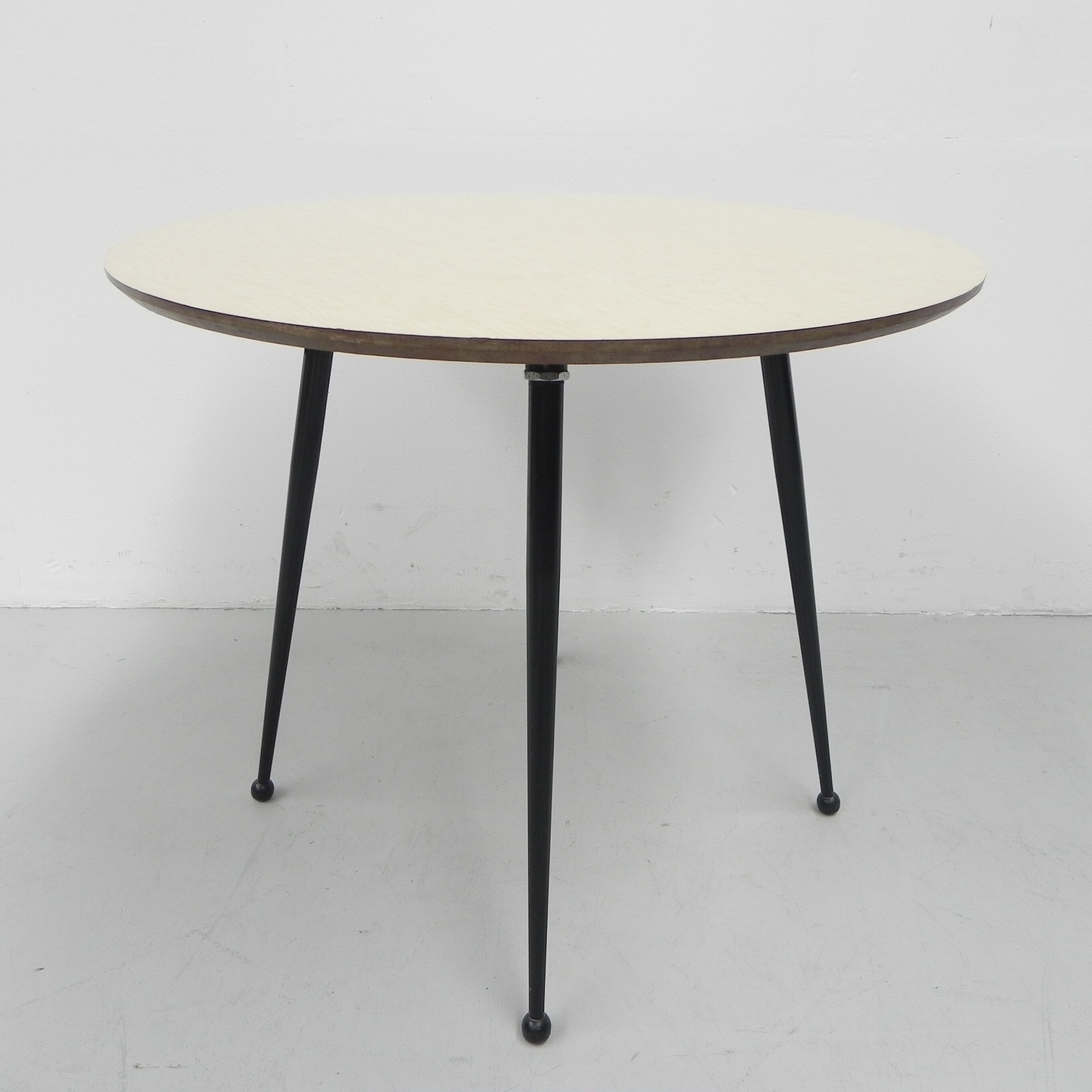 Vintage coffee table with round formica top