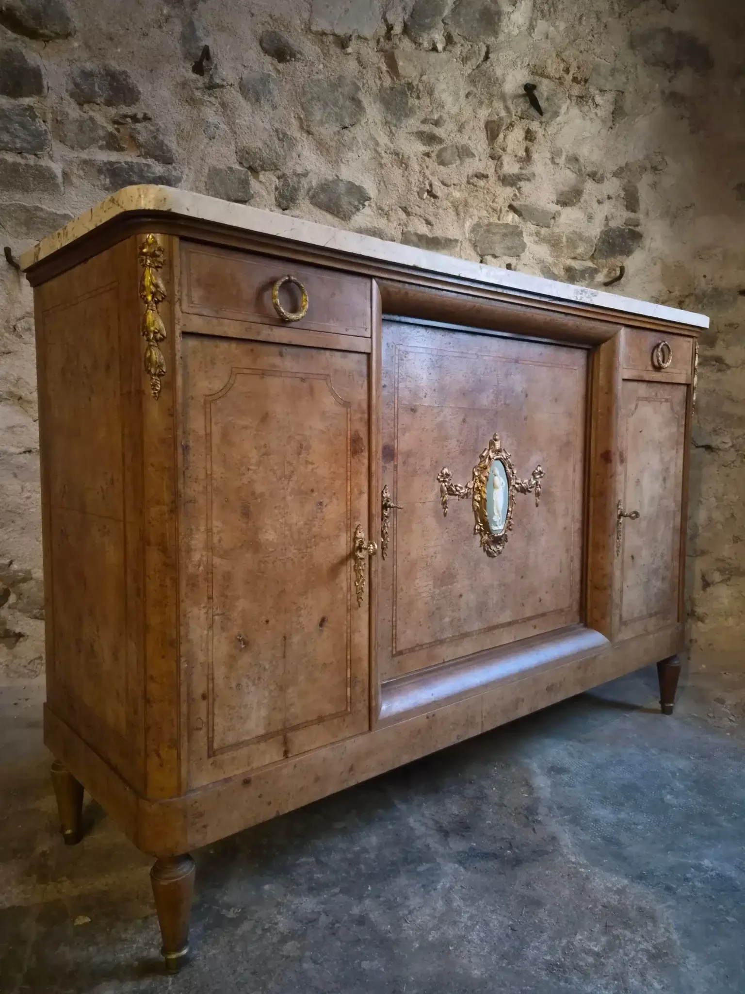 Antique Louis XVI style buffet in burr elm with marble top, late 19th century.