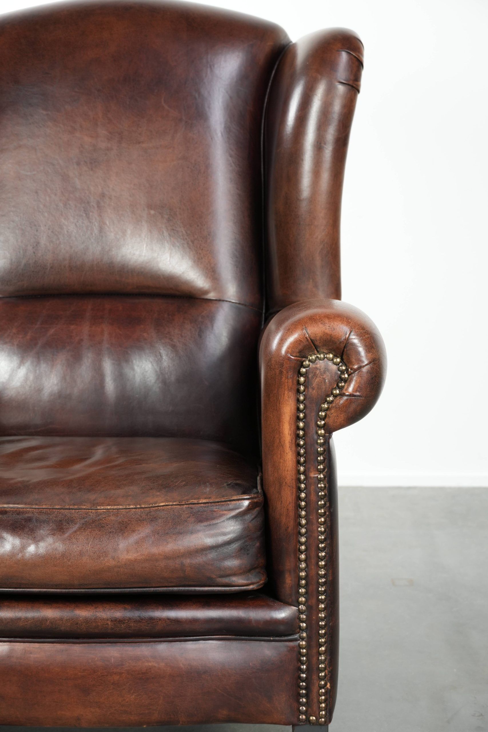 Sheepskin wingback armchair with beautiful deep and warm colours