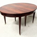 Louis XVI style bandeau table with 6 XIX century tapered legs.