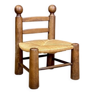 Brutalist low chair in straw and oak, 1950s, France