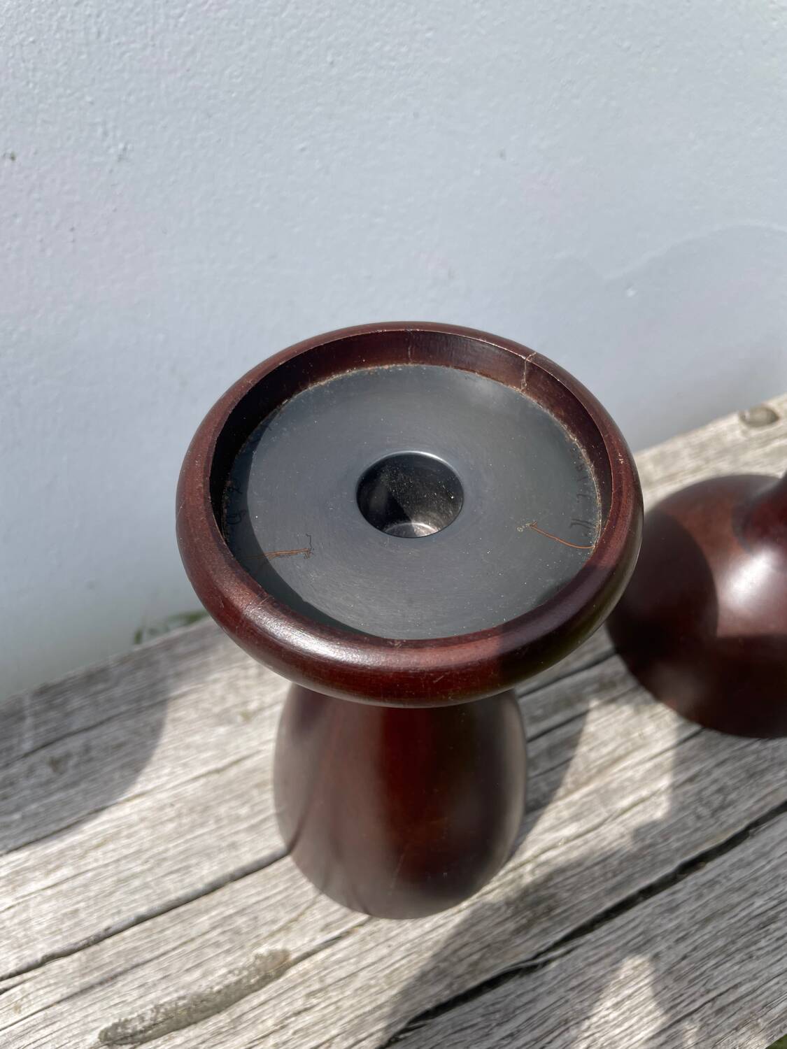Trio of large turned wooden candlesticks