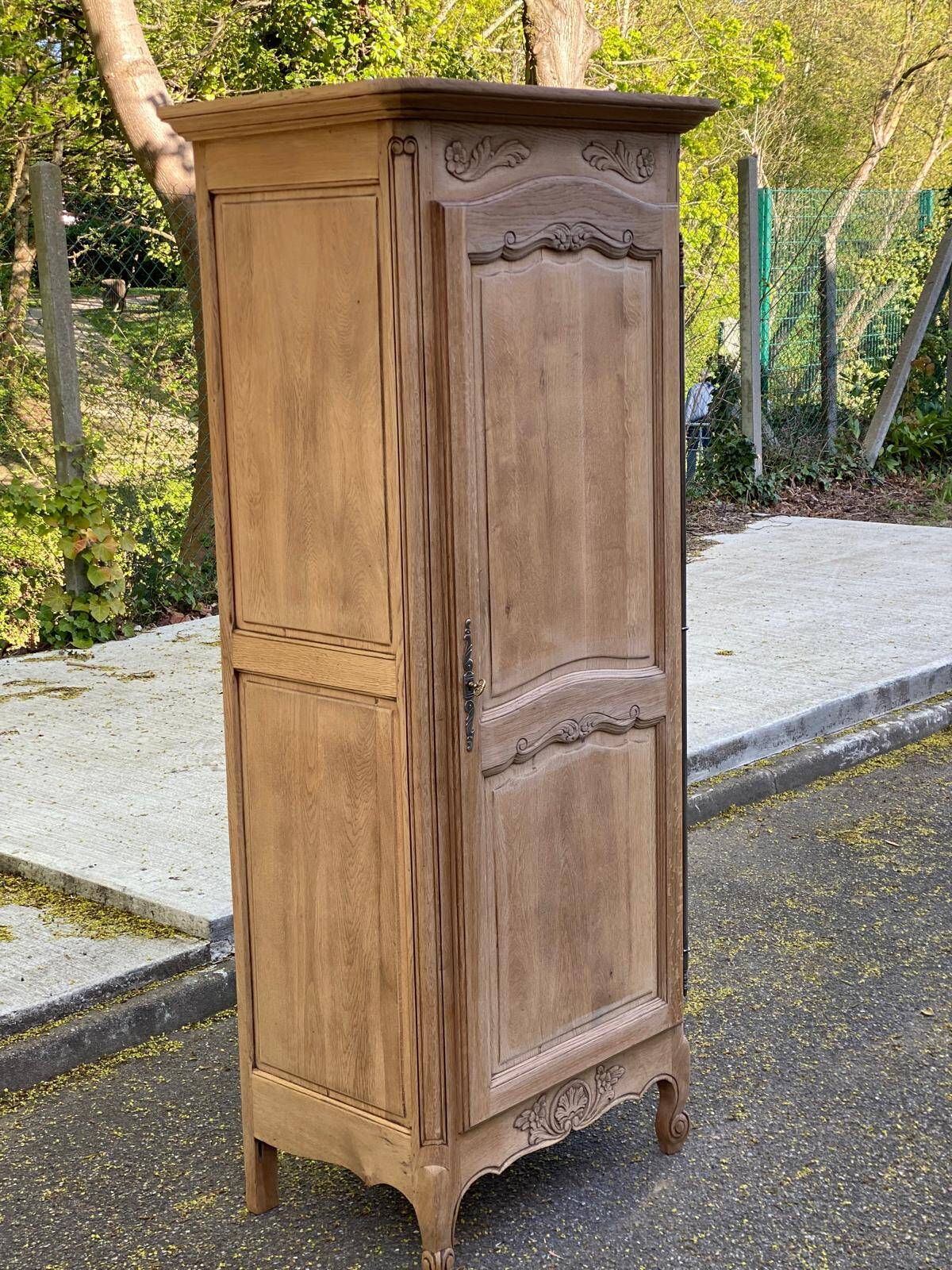 Renovated Louis XV bonnetière dormitory wardrobe in solid oak.