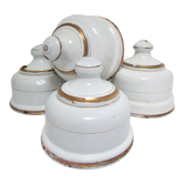 Four white enamelled metal cheese bells early twentieth century