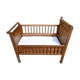 Old children's bed with retractable walnut bars