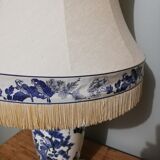 Ceramic lamp with Asian decoration with matching lampshade.