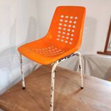 Chair with openwork plastic shell 1970