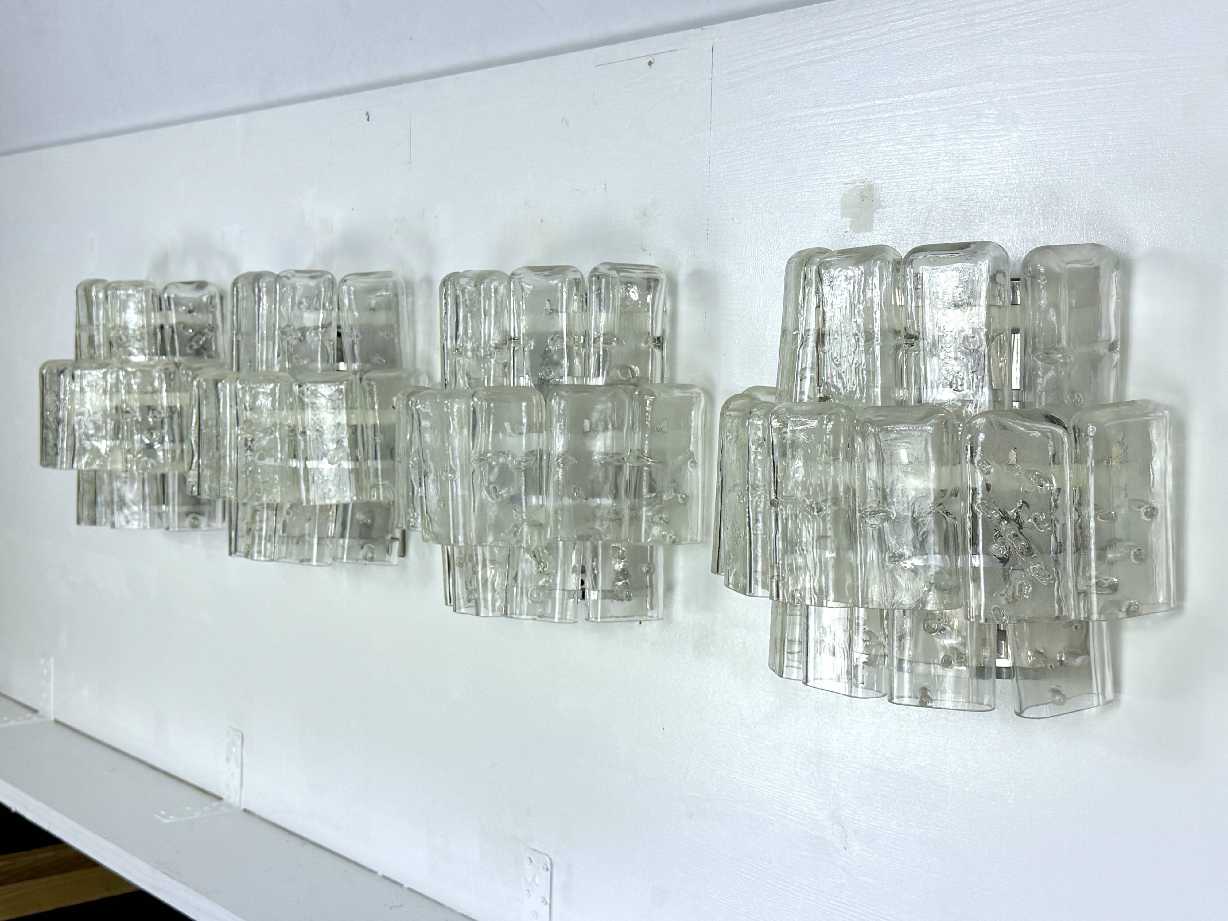 Vistosi manner, set of four large clear murano glass elements sconces. Italy 1970s
