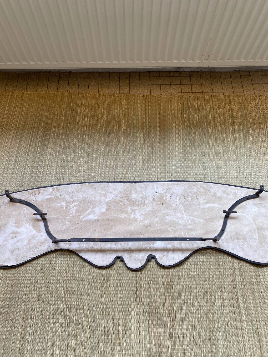 Taxes / wrought iron pediment