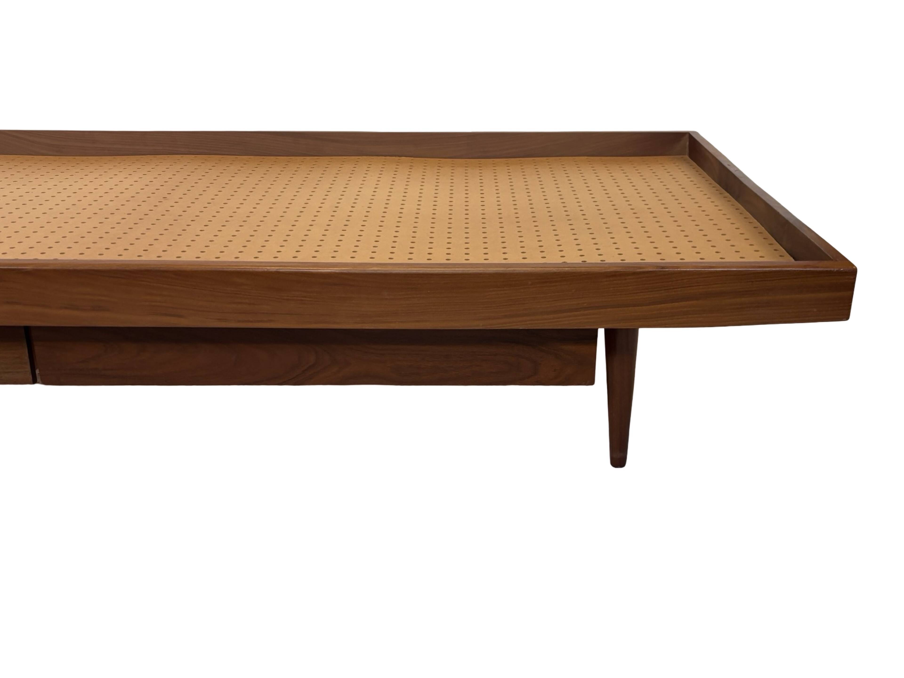 Vintage 1950s teak sofa bed with drawers.