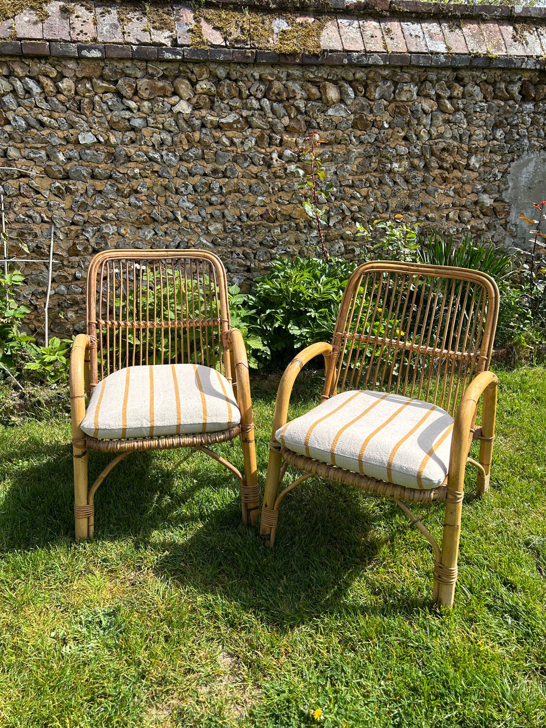 Vintage 1970s rattan armchair pair