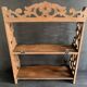Antique shelf with openwork wooden pediment, early 20th century