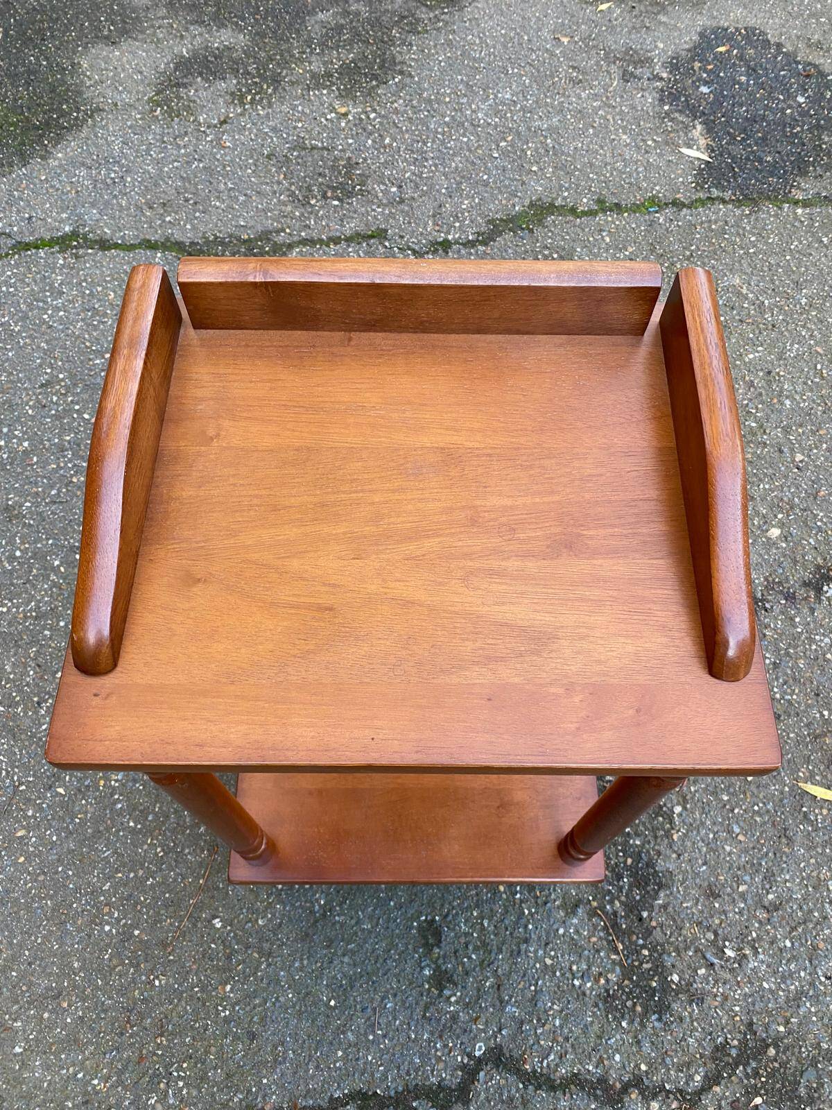 Solid wood shelf with carved legs