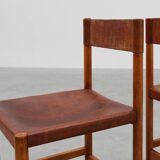 Pair of wood and leather Spanish chairs by Jordi Vilanova, ca. 1960