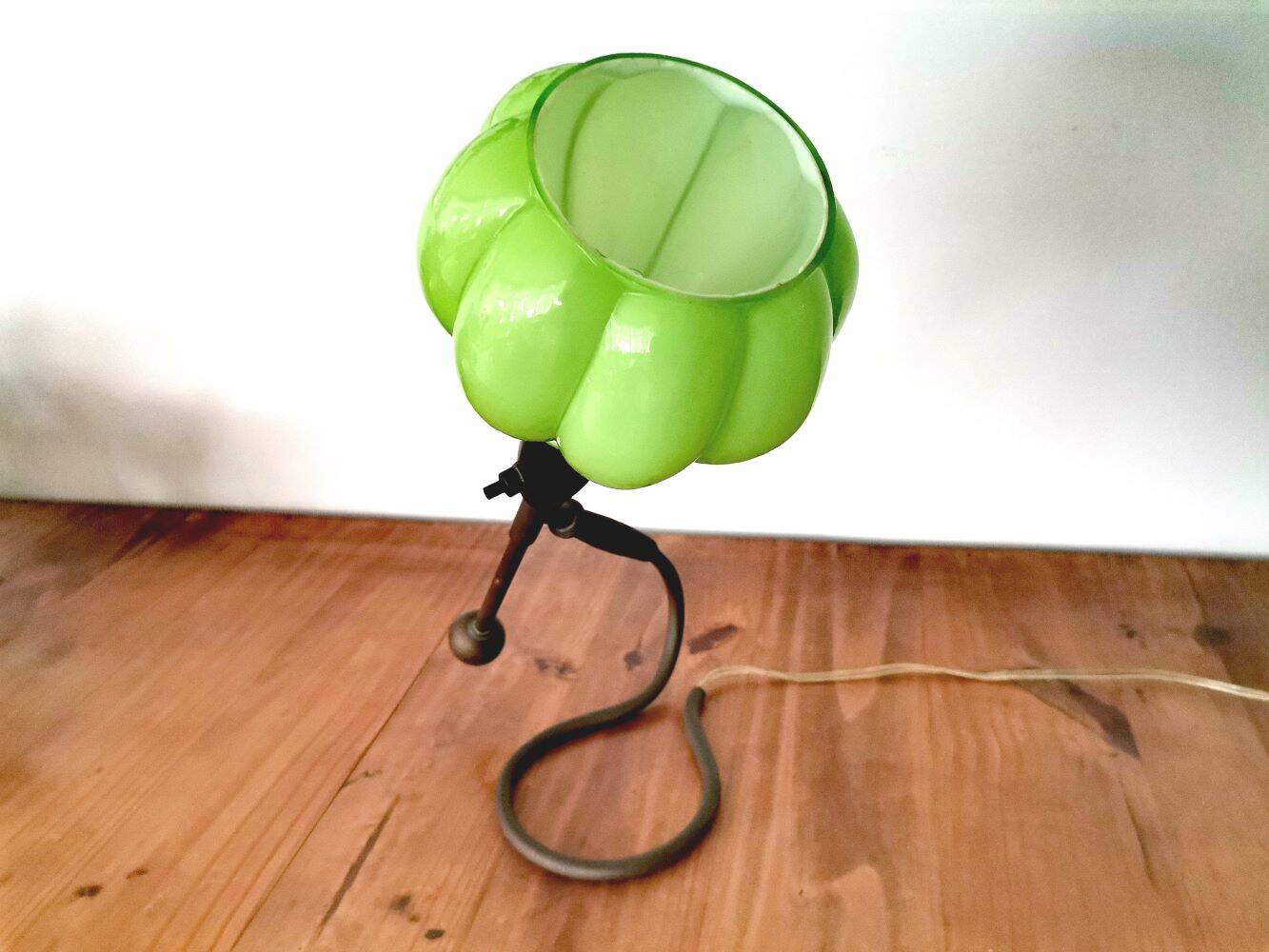 Modernist green cased glass and brass articulated table lamp