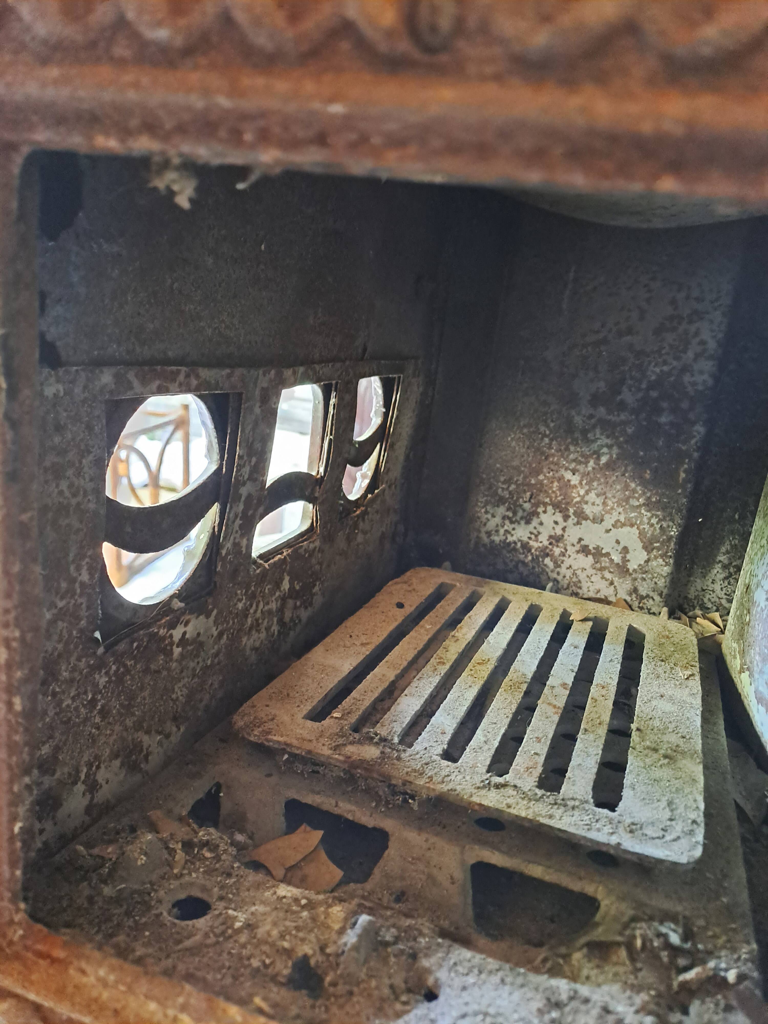 Antique enameled cast iron art deco wood stove, Phebus brand, aubergine color