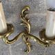 Paire de lampes d'appliques baroques en bronze doré