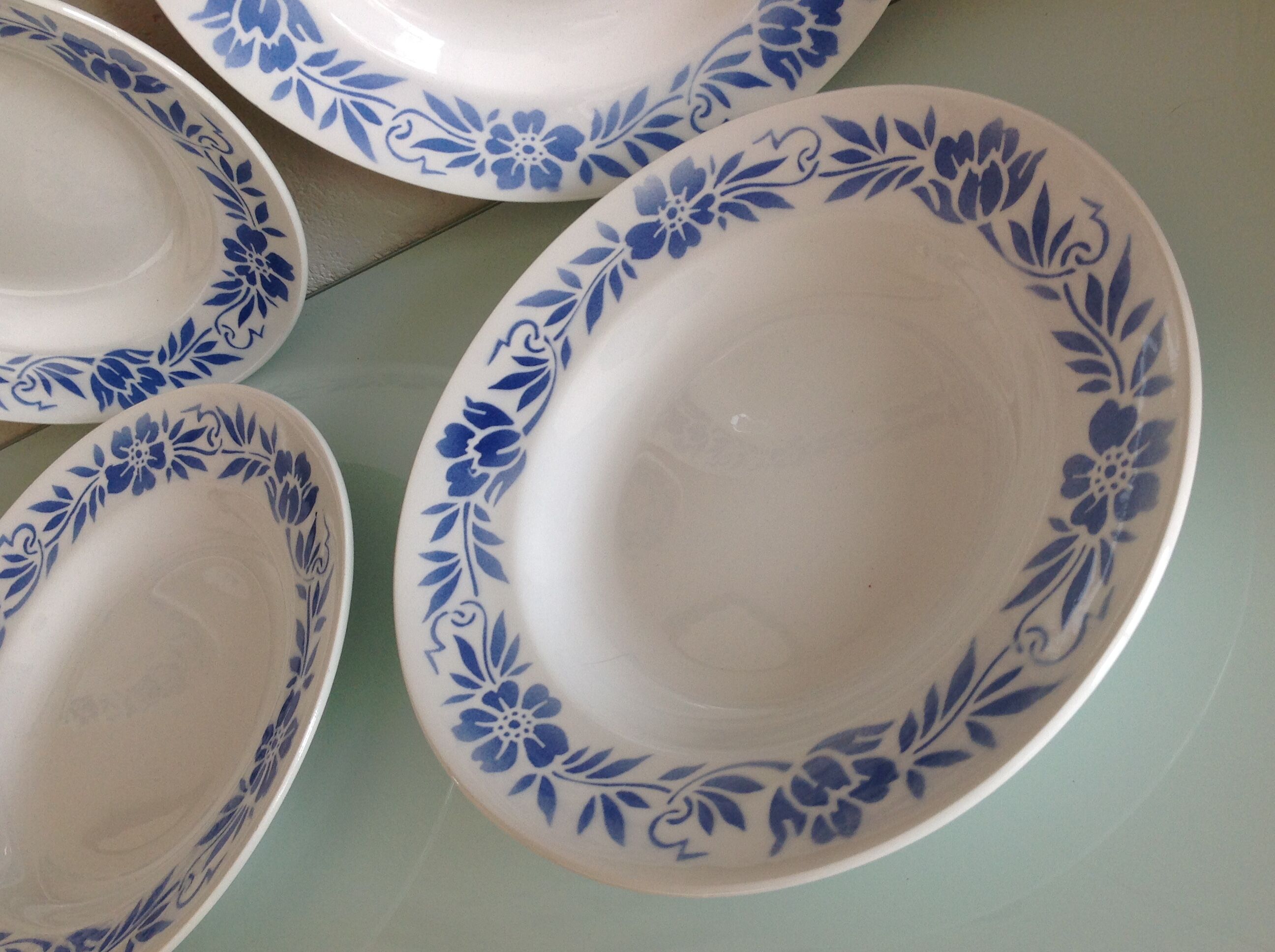 Suite of six white hollow plates with blue flowers by Moulin des Loups / vintage years 50-60