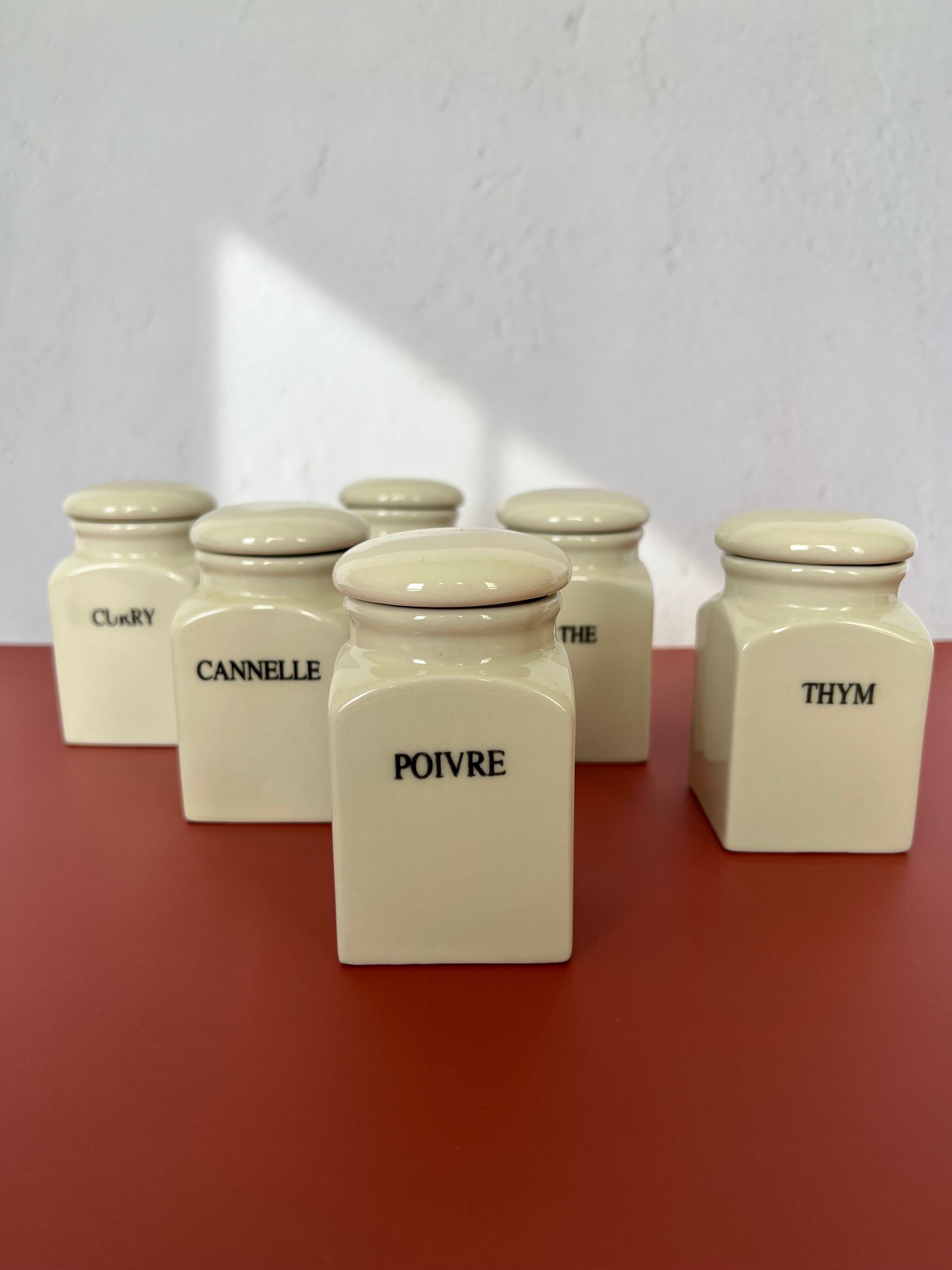 Set of vintage porcelain spice jars