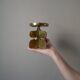 Brutalist brass candle holder, golden metal chandelier, vintage Scandinavian design.