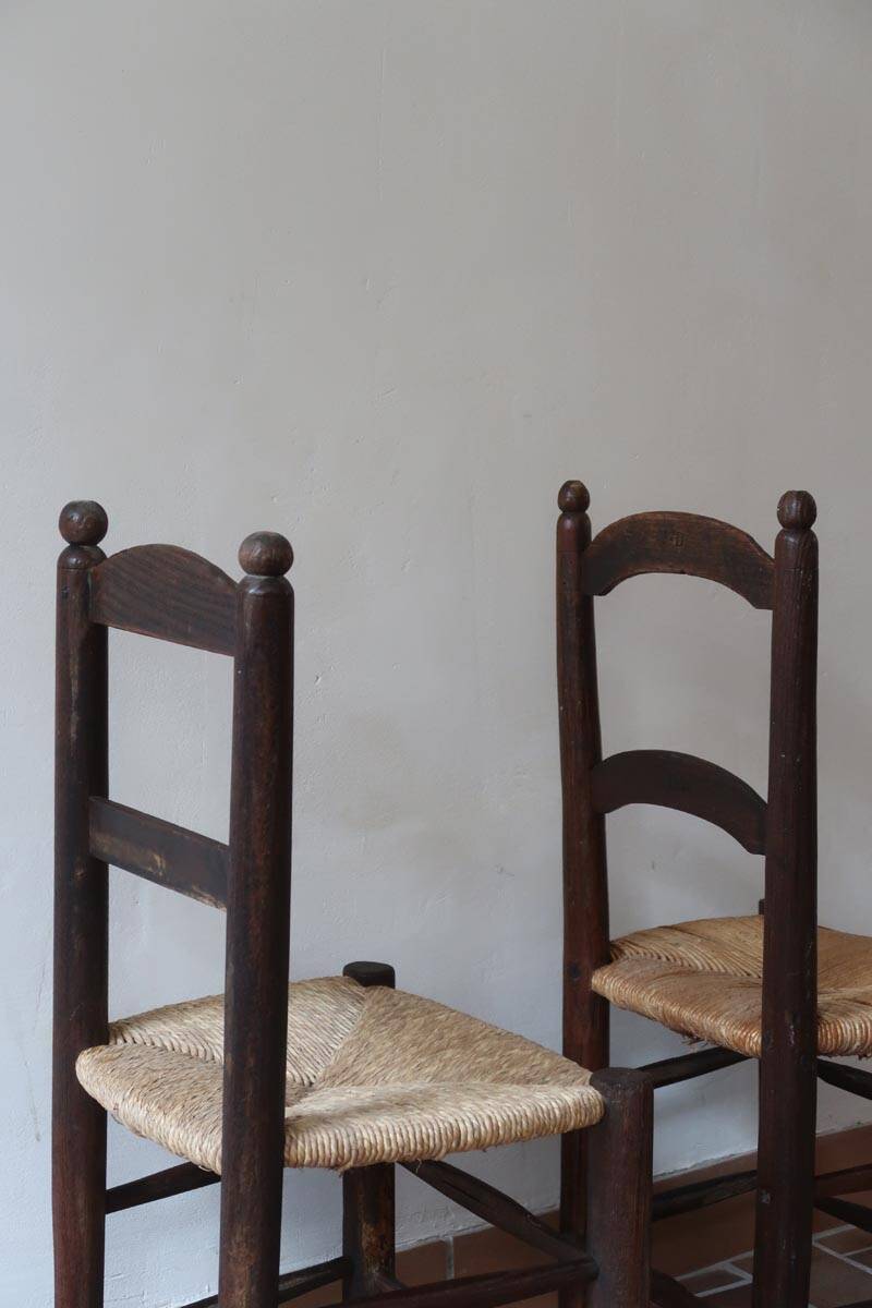 Pair of straw farm chairs