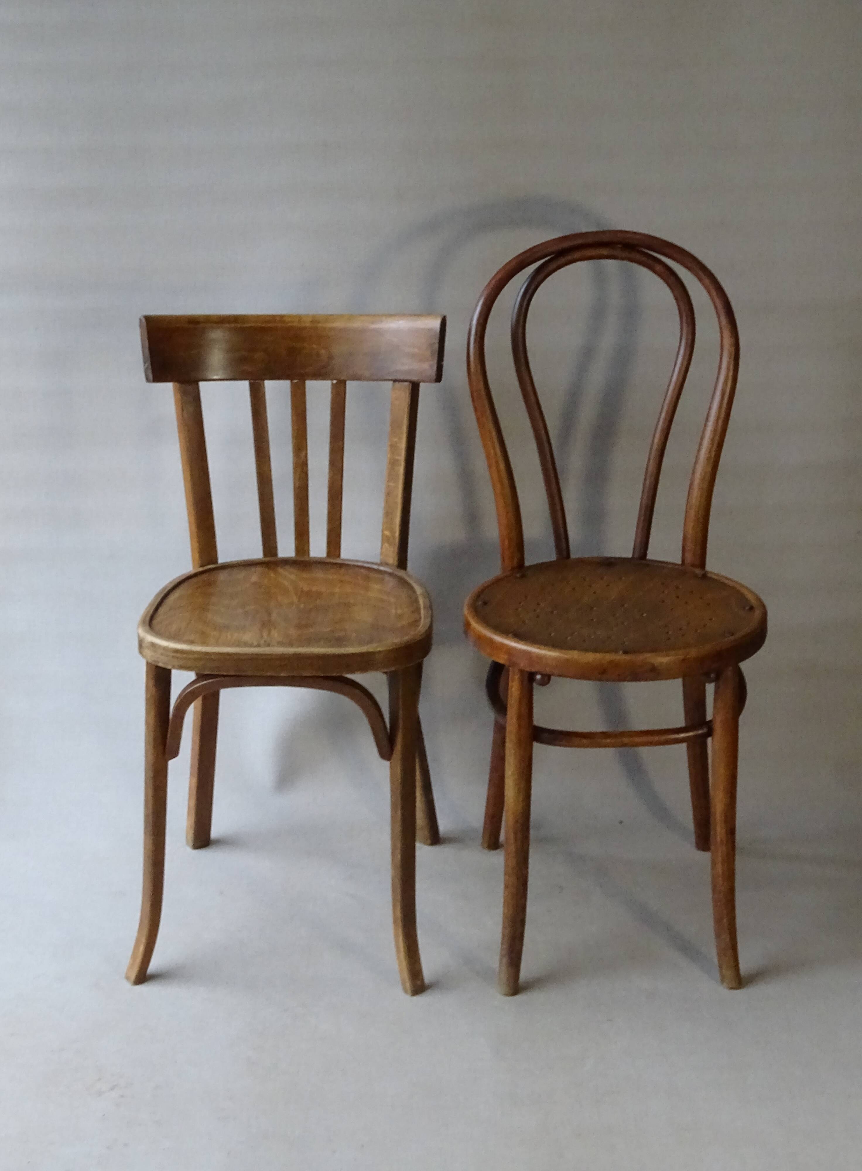 Set of 36 mismatched Bistrot chairs, 1920 to 1950, wooden seats.