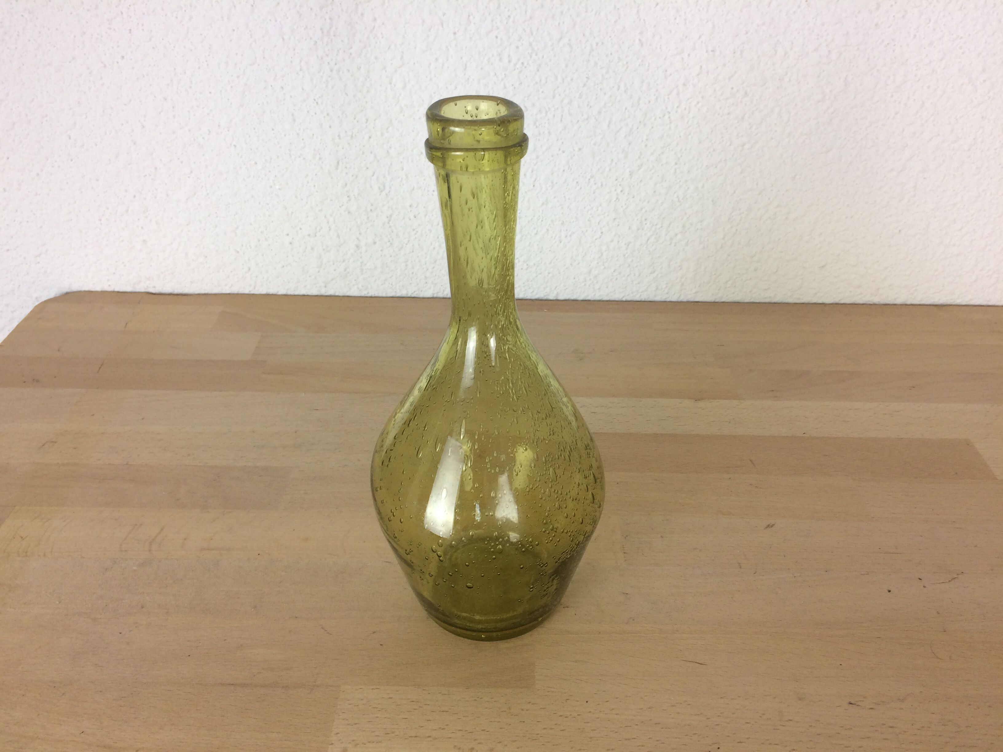 Green bubbled glass vase