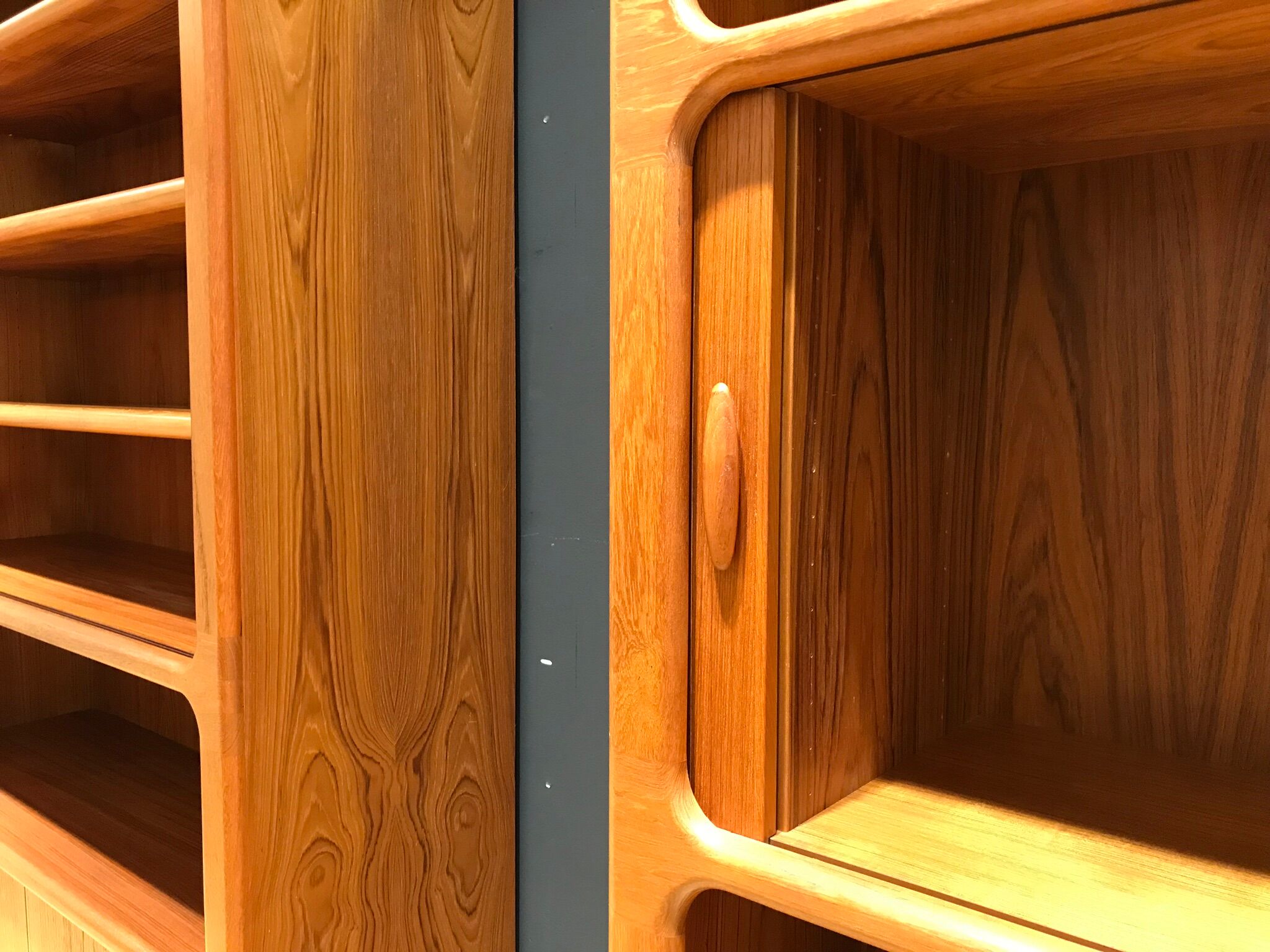 Teak wall system by Niels Bach for Dyrlund, 1970