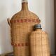 Duo de bouteilles en rotin