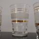 Set of 5 water glasses and 5 aperitif glasses with granite decorations and gold edging from the 1950s