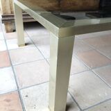 Smoked glass and brass coffee table