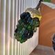 Bronze table lamp and Murano glass grape clusters.