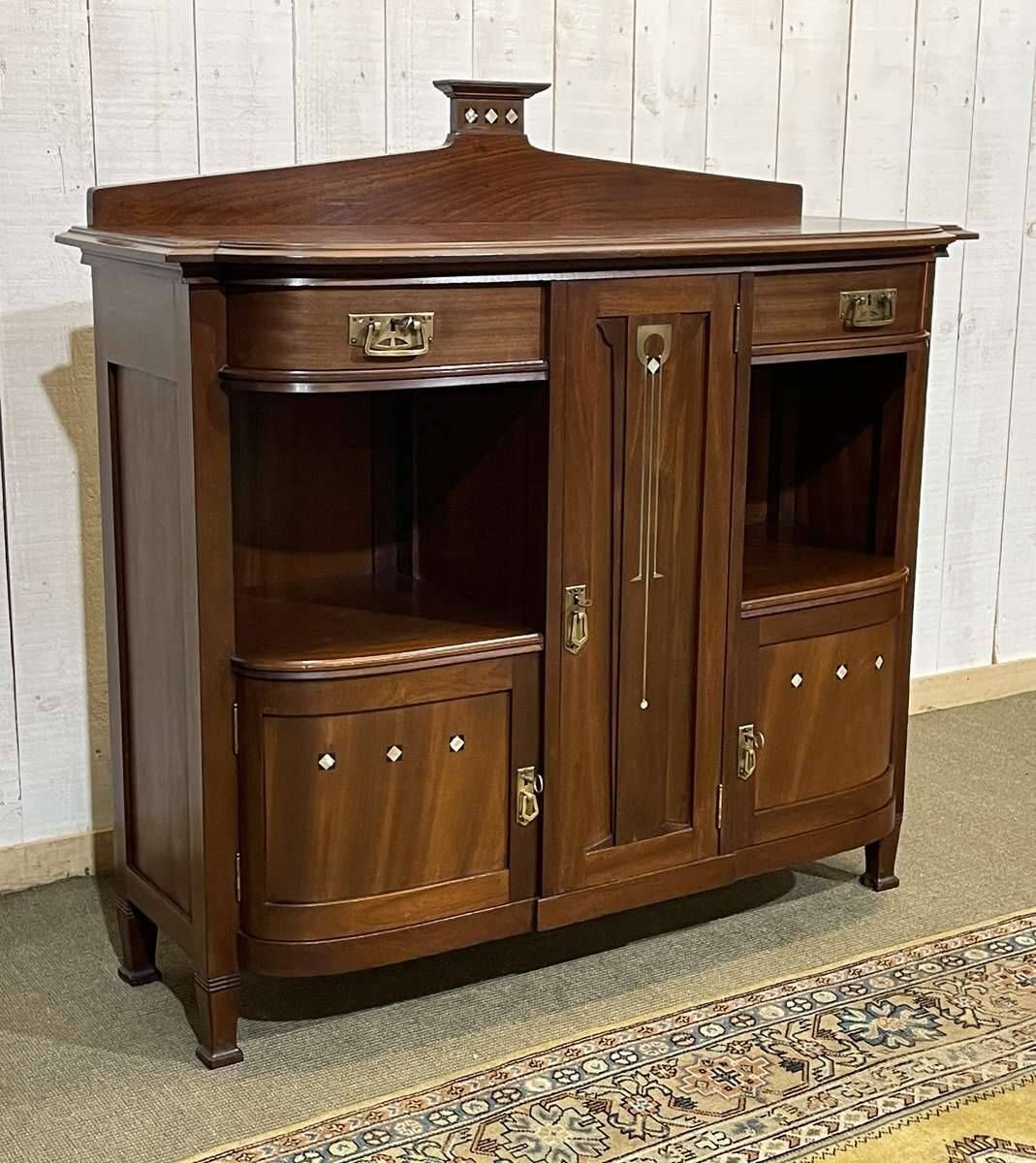 Mahogany sideboard from the Art Nouveau period in the style of Gustave Serrurier-Bovy.