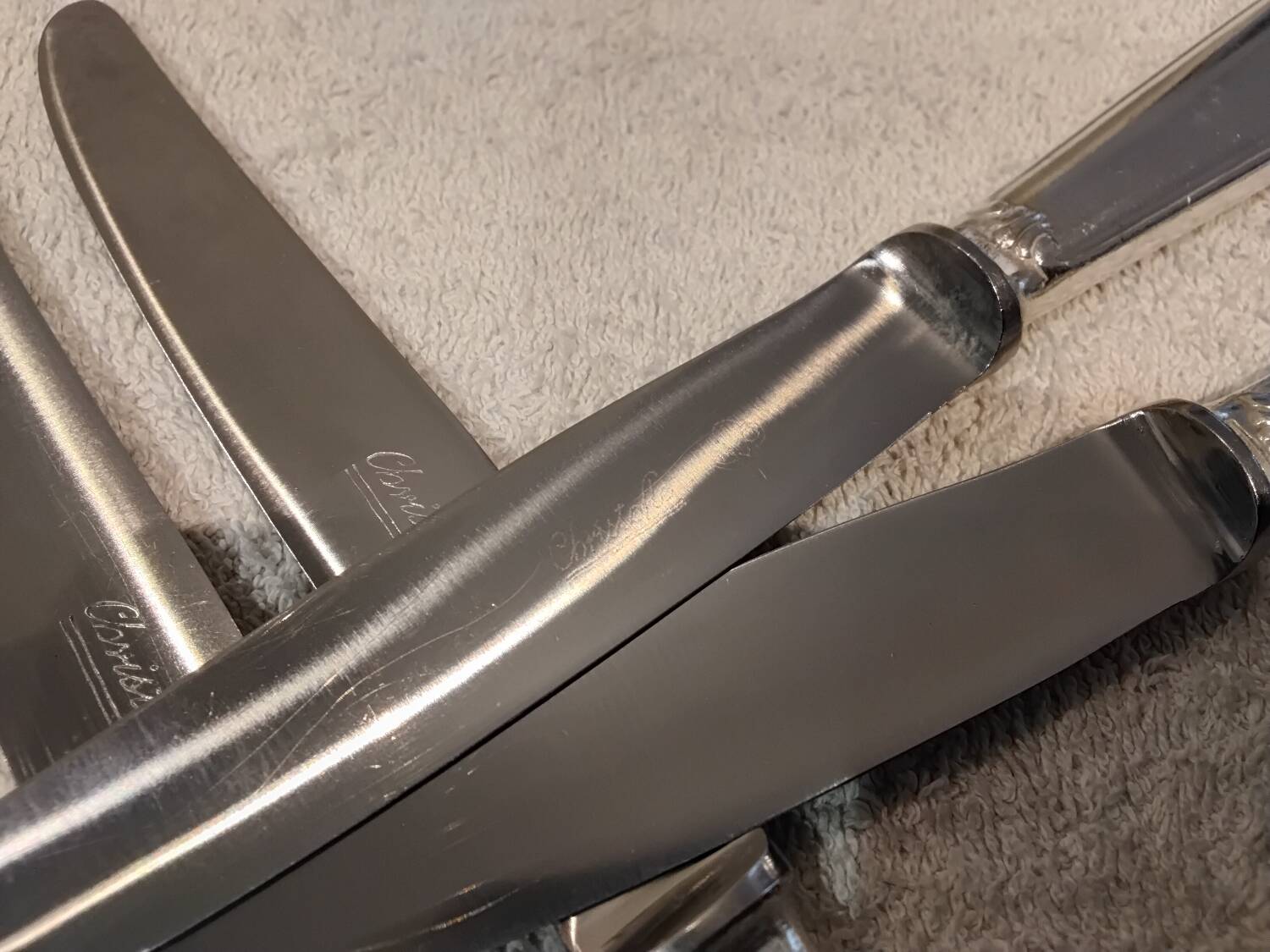 12 silver-plated dessert knives by Christofle Vendôme, 20.3cm